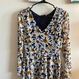 light flowy long sleeve flower romper perfect for summer